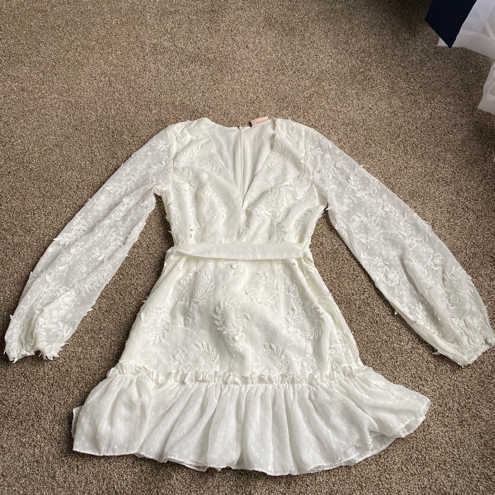 ShowPo dress ordered for graduation to short and has big low V in front